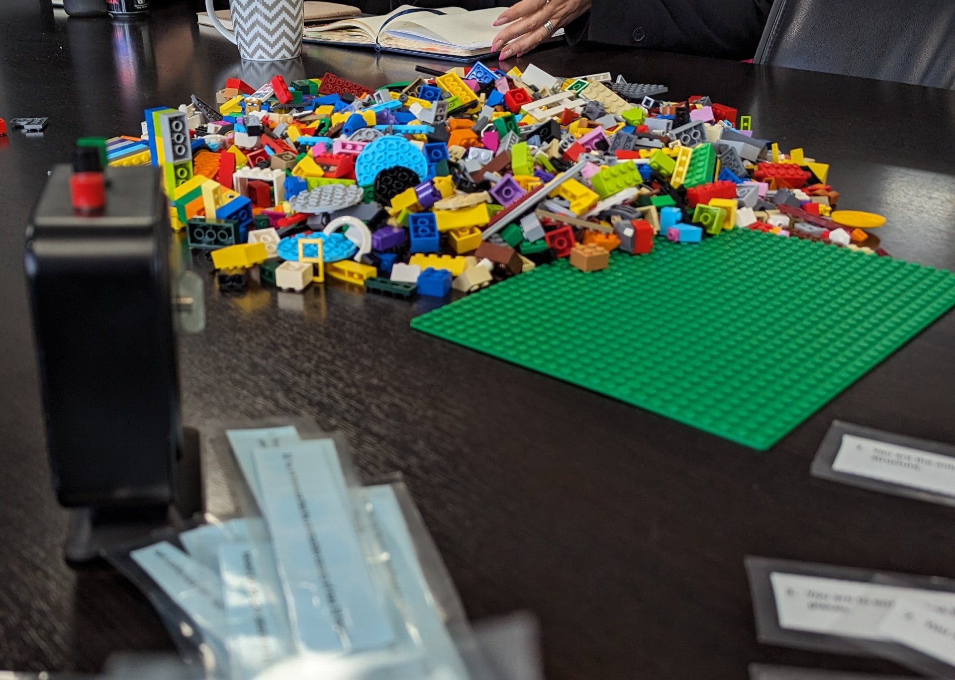 A pile of colourful building bricks ready for a workshop