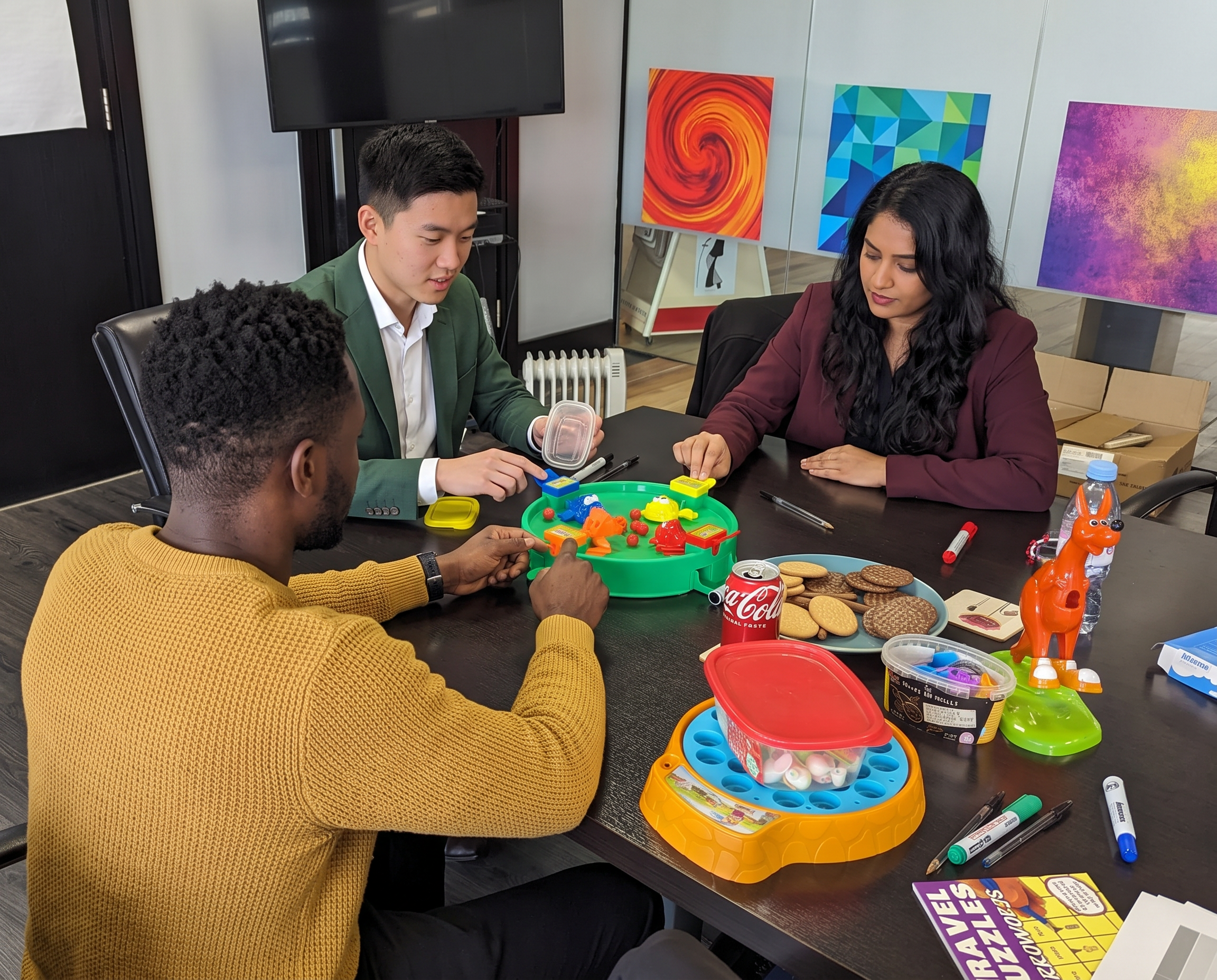 A team playing a tabletop game during an ideas session